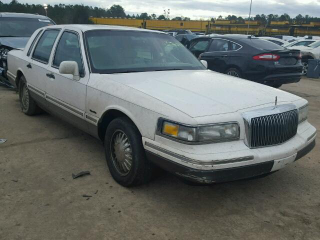 (Here’s another pic I found online. Much better match of the car in question, right down to the grey trim at the bottom.)